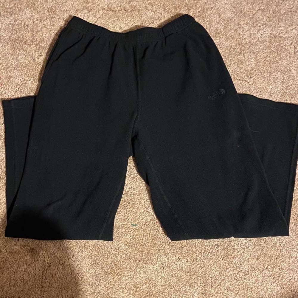 Black men’s North Face sweatpants
